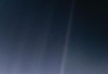 A Tiny Speck: Viewing Our Planet from Six Billion Kilometers Away