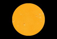 A Busy Day on the Sun: 11 Sunspot Clusters Visible to the Naked Eye