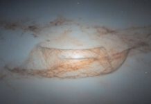 New Hubble Image Reveals Fascinating Lens-Shaped Galaxy NGC 4753